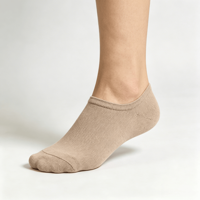 Smooth inverted-seam beige diabetic no-show socks to reduce friction on toes and foot sides

