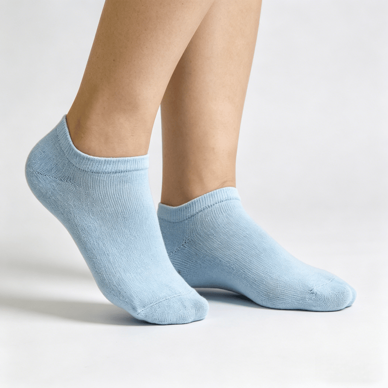 Light blue diabetic no-show socks with mesh knit at arch for enhanced airflow and reduced stuffiness