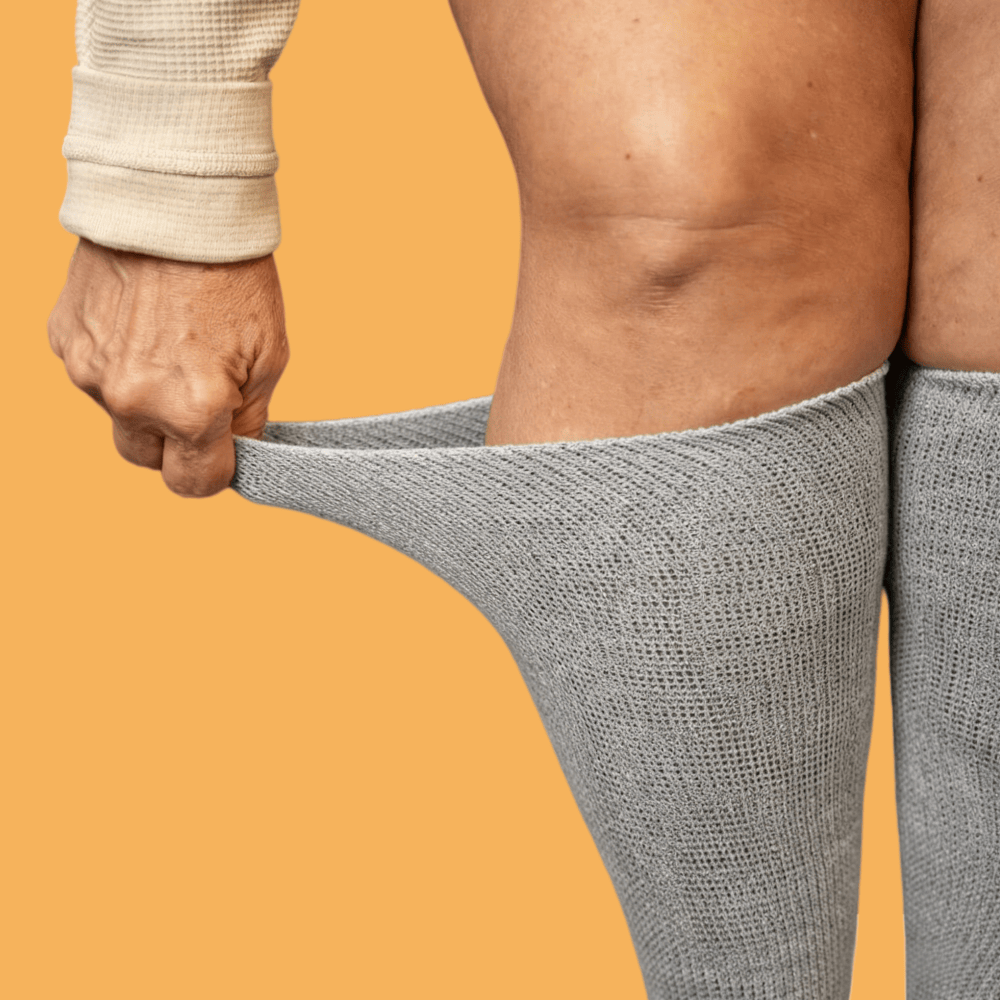 Soothe swollen, tired feet with DiaFlow™ gray acupressure socks. Strategically positioned massage points encourage steady circulation, providing consistent daily support for diabetic feet.