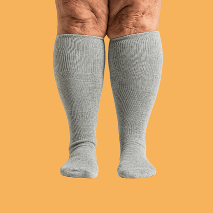 Fight foot swelling with DiaFlow™ gray acupressure socks. Designed pressure points improve circulation, delivering comfortable daily support ideal for diabetic foot care.