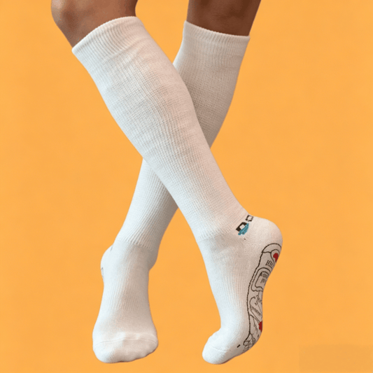 Therapeutic white DiaFlow™ pressure point socks designed for natural edema reduction and daily foot care
