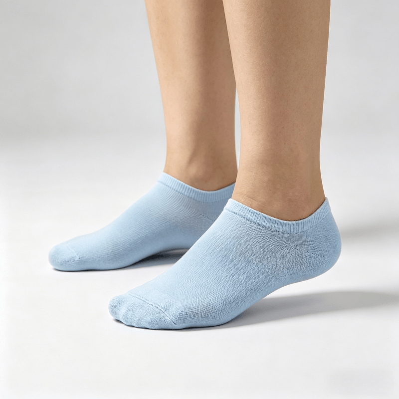 Smooth flat-seam light blue diabetic no-show socks to minimize friction irritation on toes and foot sides