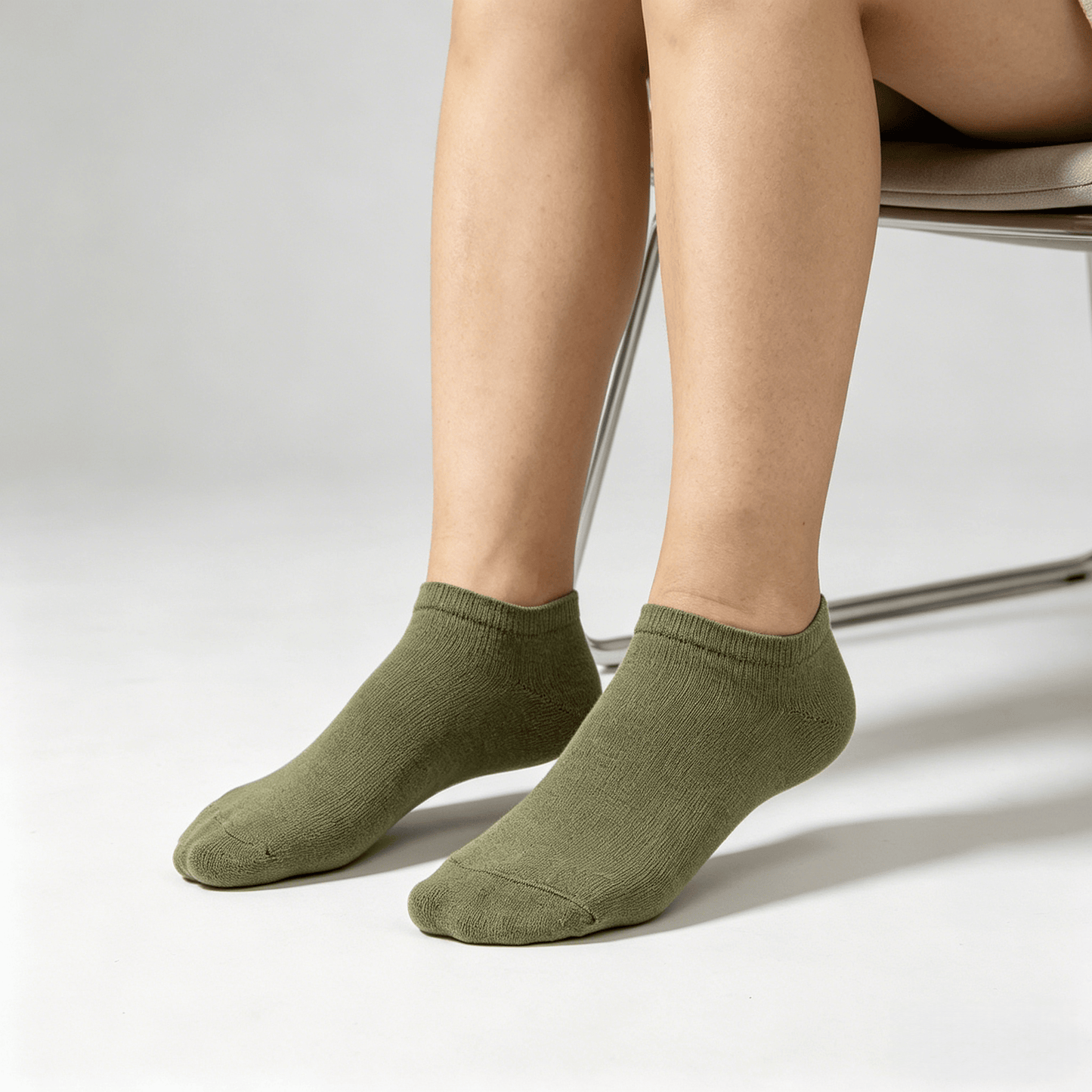 Olive green diabetic no-show socks with silicone heel grip and non-binding fit to prevent slipping while walking
