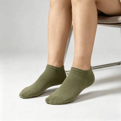 Olive green diabetic no-show socks with silicone heel grip and non-binding fit to prevent slipping while walking