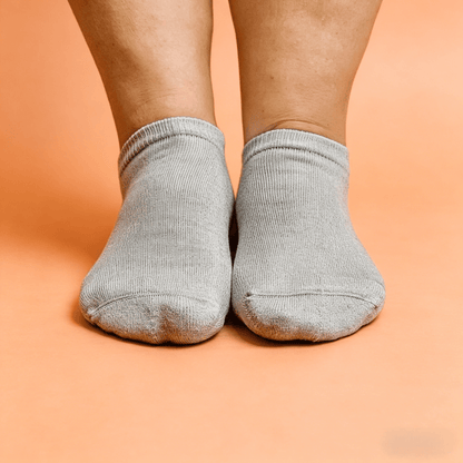 Gray short ankle socks with sole acupressure mapping for neuropathy relief